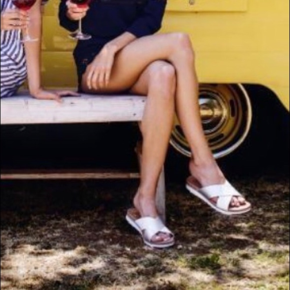 Silver and white UGG ‘Kari’ slides / sandals